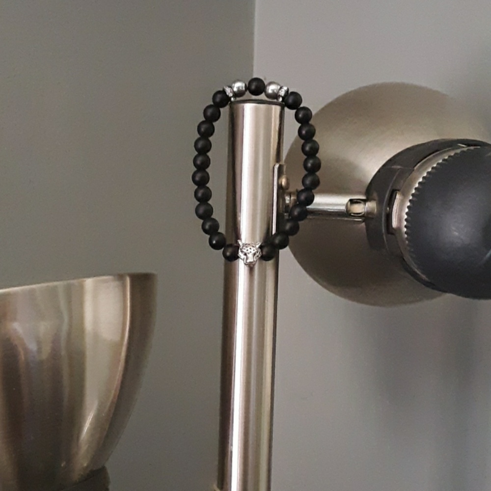 Black and silver cheetah head bracelet
